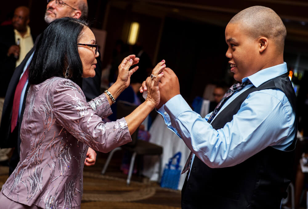 woman dancing with child